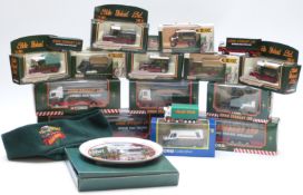 Fifteen Corgi and Lledo Eddie Stobart diecast model vehicles together with a small matching hat