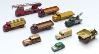 Ten Dinky Toys diecast mode commercial vehicles including fire engine, ambulance, Portland Cement