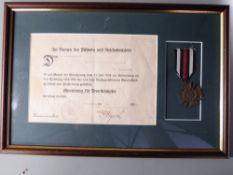 German Army WWI Hindenburg Cross medal with certificate, framed and mounted