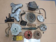 A quantity of motorcycle parts including JAP crankcases, BSA timing cases, hubs, Ariel Arrow parts