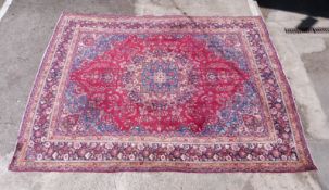 Red ground handwoven rug 292 x 376cm