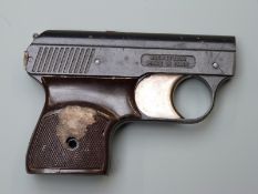 Mondial Model 1949 .22 starting pistol with named and chequered Bakelite grips, in original box.