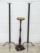 Pair of blacksmith made candlesticks, H90 and a 19th/20thc ashtray raised on brass claw feet