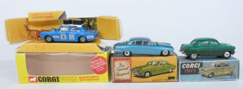 Three Corgi Toys diecast model cars comprising Ford Consul Saloon with two-tone green body 200,