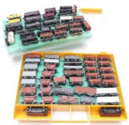 Sixty-four Peco, Graham Farish and similar N gauge wagons, vans and tankers including BP, N Gauge