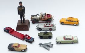 Eight Corgi, Dinky and Matchbox diecast model vehicles including Chitty Chitty Bang Bang, James Bond