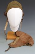 Two lightweight flying helmets, one leather the other canvas