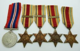 WWII British medals comprising four Africa Stars with clasps for 1st Army, 8th Army and North Africa