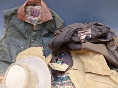 Three waterproof coats comprising Mulberry waistcoat (L), Driza-bone stockman's jacket (XL) and