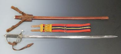 An 1897 pattern infantry officer's sword with shagreen and wire grip, in leather scabbard, the