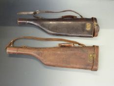 Two brown leather leg of mutton shotgun cases with slings and carry handles, one with key, each