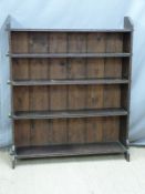 19thc  carved oak peg jointed campaign style bookcase. W100 x D29 x H120cm