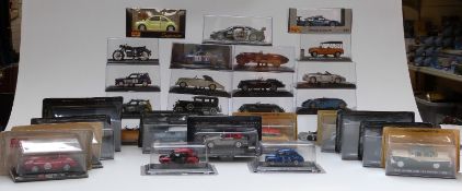 Thirty-two Maisto, Atlas Editions and similar diecast model cars, all in original display boxes.