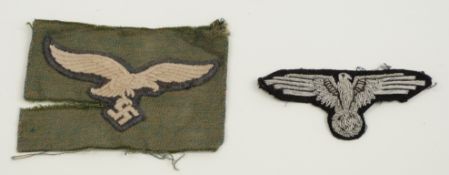 Two German Third Reich eagle, cloth insignia, one SS officer, the other Luftwaffe paratrooper