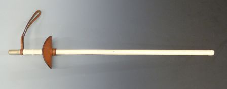 Training sword or baton with painted braided decoration and brown leather hilt and wrist strap, 93cm