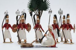 Eight CBG Mignot diecast model Arabic soldiers and figures including a snake charmer together with a