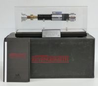 Master Replicas Star Wars Revenge of the Sith Obi-Wan Kenobi Lightsaber SW-130 on display stand in