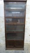Globe Wernicke style glazed oak six division bookcase, the bottom piece a two door cabinet. W88 x