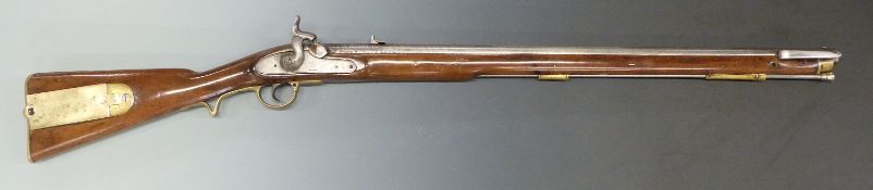 Brunswick percussion hammer action rifle with engraved lion to the lock, brass trigger guard,