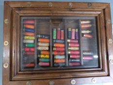Wooden shotgun cartridge glazed display case with 44 paper cased cartridges including Eley,