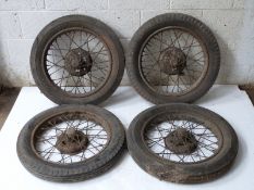 Four 19 inch closed script centre Austin Seven wheels