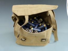 One-hundred-and-ninety-nine Gamebore Blue Diamond 12 bore shotgun cartridges and military canvas