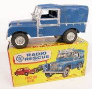 Marx friction model RAC Radio Rescue Truck with blue body and silver trim and hubs, in original box.