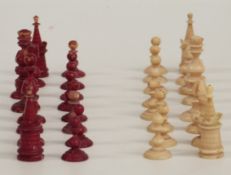 An 18thC English antique ivory chess set with cleft knights, in original bentwood box with faded