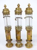 Three Victorian style brass and copper lamps, two marked GWR the other GNR
