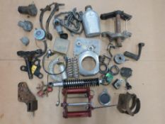 A quantity of motorcycle spares including BSA footbrakes, FS1E yokes etc