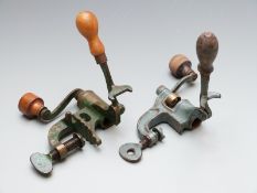 Two shotgun cartridge reloading rollover tools, one 12 bore and one 20 bore