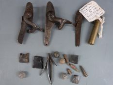 Three percussion hammer action gun locks together with an Enfield brass .303 rifle oil bottle and