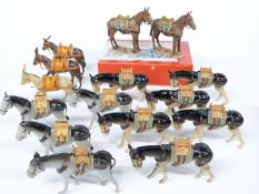 Fifteen Mitrecap and Britains diecast model mules, two in original box