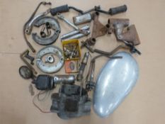 A quantity of motorcycle spares including BSA gearbox shell, Bantam footrests, Matchless yoke etc