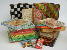 A collection of vintage games and jigsaw puzzles including Victory, Merit Solitaire, draughtsmen