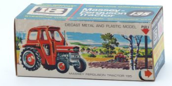 Britains model Massey-Ferguson Tractor 135 with red and grey body and removable cab 9529, in