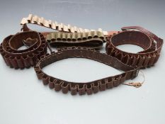 Five shotgun cartridge belts, three brown leather and two canvas