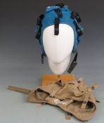 Two crewman's flight deck helmets