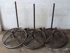 Three industrial style circular clothes rails or similar shop display racks, ex Superdry stores