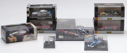 Eight Onyx, Minichamps and Hasbro Hotwheels diecast model racing cars and racing car sets, all in