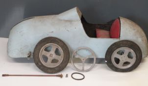 Vintage child's pedal racing car of steel construction with upholstered seat, possibly modelled on a