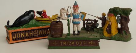 Three novelty cast metal mechanical money boxes Trick Dog, Jonah and the Whale and Boy Scout Camp