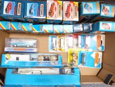 Twenty-six Matchbox diecast model vehicles including SuperKings, Superfast, The Dinky Collection