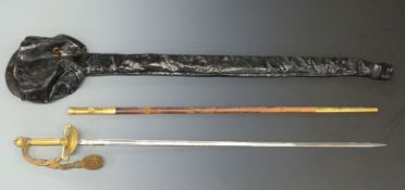 Dress Elizabeth II dress sword with brass hilt by Wilkinson, the 82cm blade etched ER, in scabbard