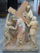 19th/20thc terracotta religious group of Jesus carrying the cross. W73 x D34 x H105cm