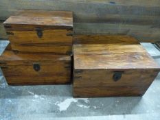 Set of three graduatedmetal bound hardwood boxes. Largest W59 x D45 x H32cm
