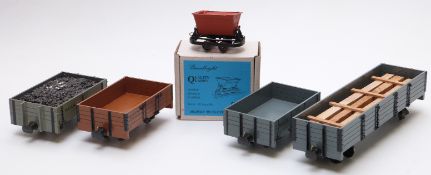 Five 32mm gauge garden railway goods wagons comprising three four-plank open wagons, bogie wagon and