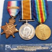 British Army WWI medals comprising 1914 'Mons' Star with clasp, War Medal and Victory Medal, named