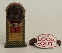 German tin plate mechanical novelty money box and an enamel British Rail 'Lock Out' armband