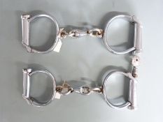 Two pairs of Hiatt Best handcuffs